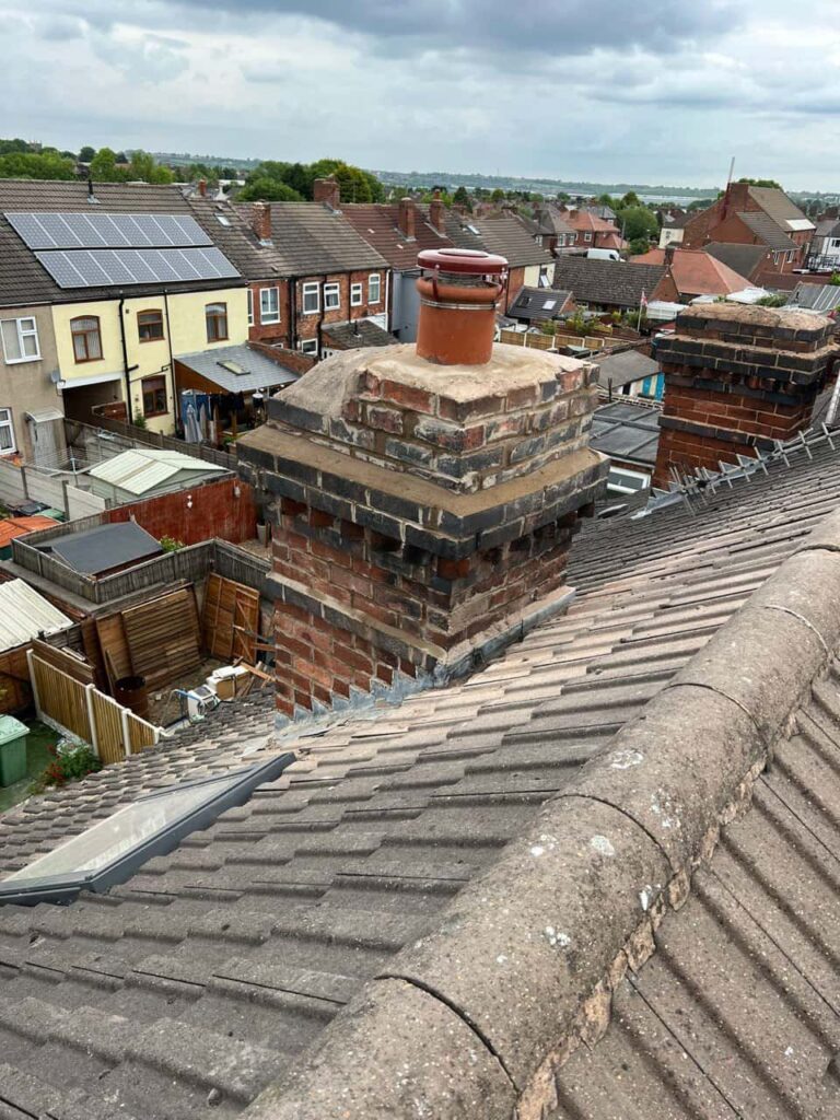 This is a photo taken from a roof which is being repaired by Wingerworth Roofing Repairs, it shows a street of houses, and their roofs